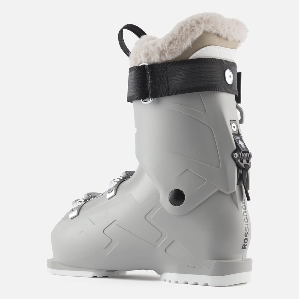Light grey Rossignol Track 70 W ski boot with faux fur lining, black power strap, and rear walk mode lever.
